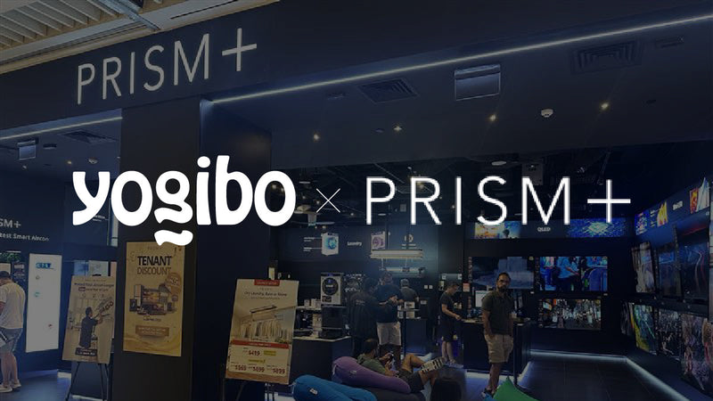 Exterior of the PRISM+ Suntec City store entrance with Yogibo bean bags arranged at the front