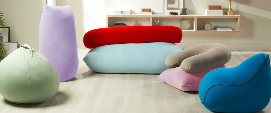 A colourful living space with Yogibo sofas and comfort pillows
